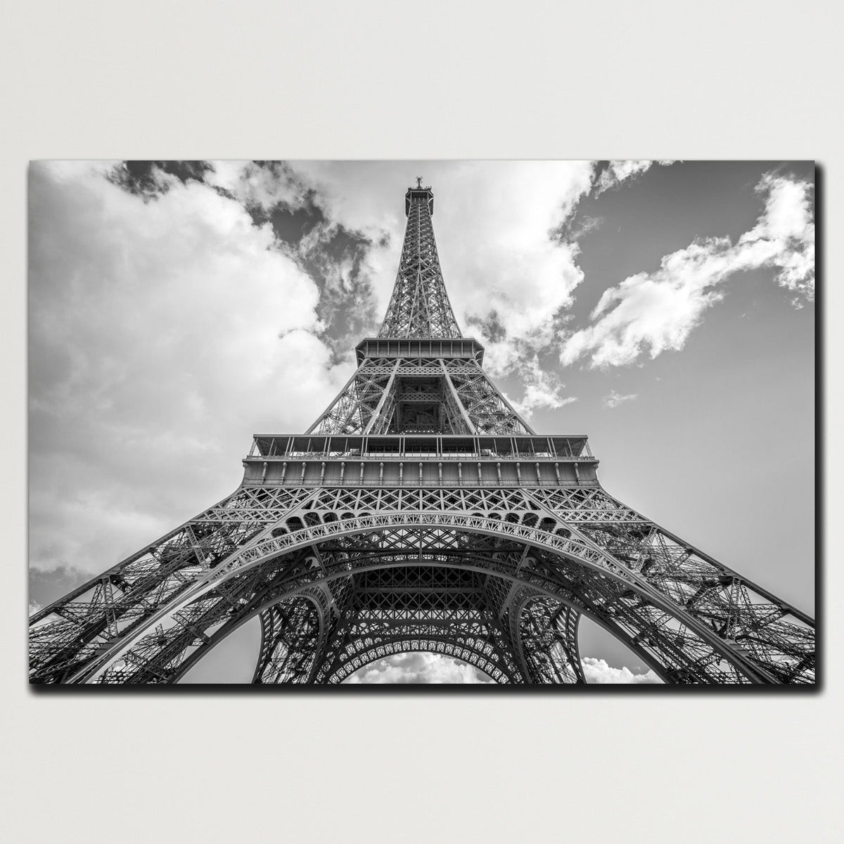 https://cdn.shopify.com/s/files/1/0387/9986/8044/products/TheIconicEiffelTowerCanvasArtprintStretched-Plain.jpg